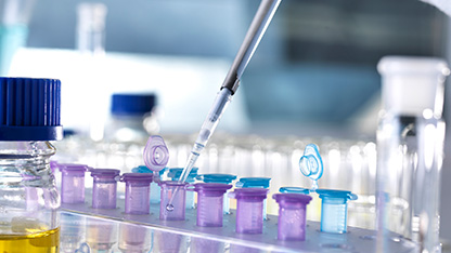 Close-up of the interior of the laboratory Instruments with pipette